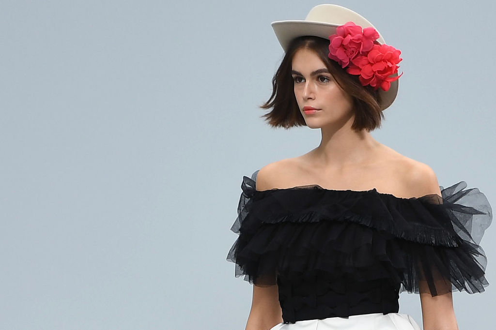 Kaia Gerber presents a creation by Chanel during the Women's Spring-Summer 2020 Ready-to-Wear collection fashion show