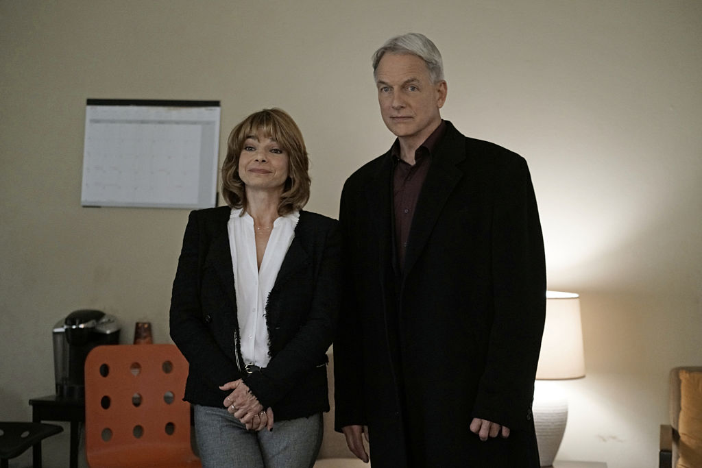 Laura San Giacomo with Mark Harmon. Giacomo plays therapist Grace Confalone on NCIS. | Jace Downs/CBS via Getty Images