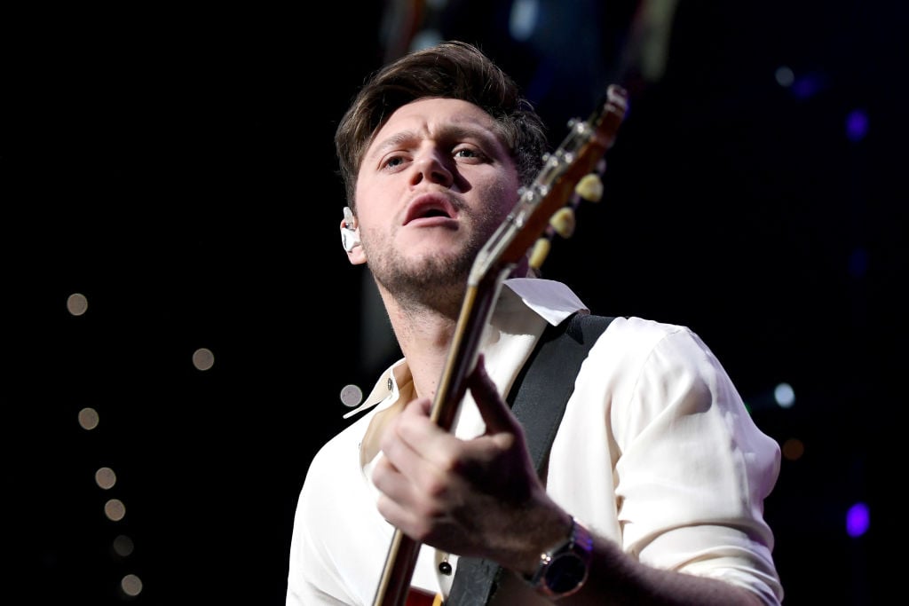 Niall Horan performing on stage at Power 96.1's Jingle Ball 2019