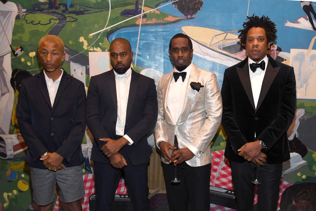 Pharrell Williams, Kanye West, Sean "Diddy" Combs, and Jay-Z attend Sean Combs 50th Birthday Bash in December 2019