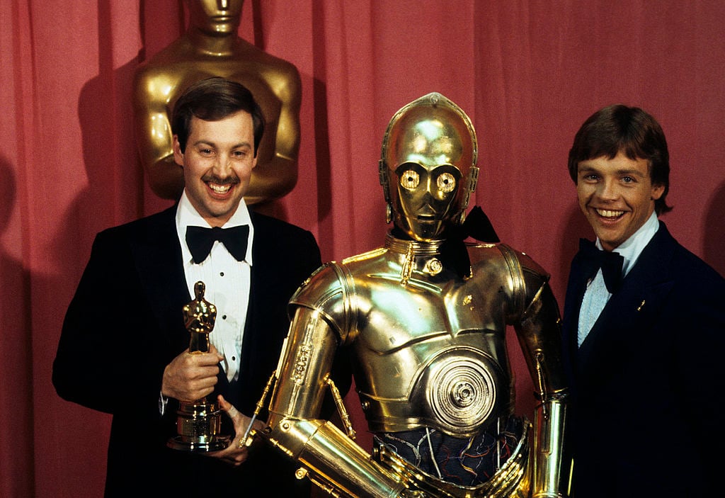 Benjamin Burtt Jr., C-3PO, and Mark Hamill at The 50th Annual Academy Awards