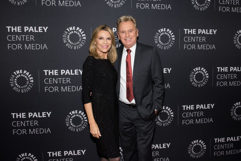Wheel of Fortune hosts Vanna White and Pat Sajak