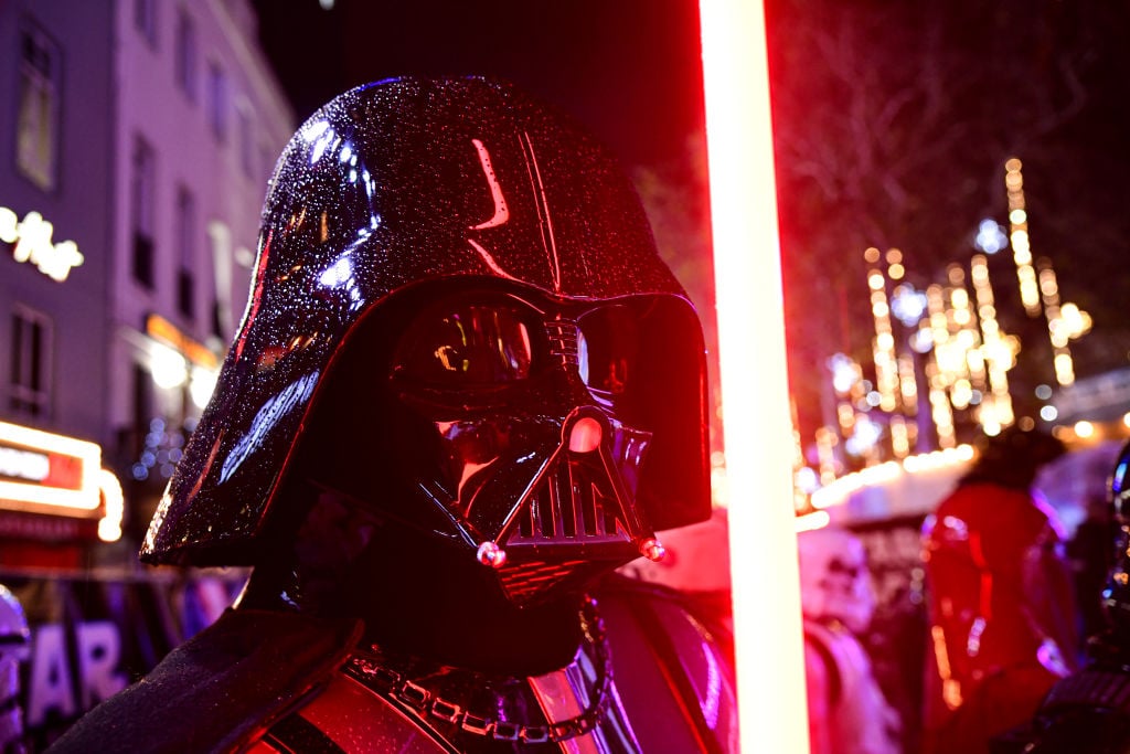 Darth Vader with his red lightsaber at the 'Star Wars: The Rise of Skywalker' Premiere in London.