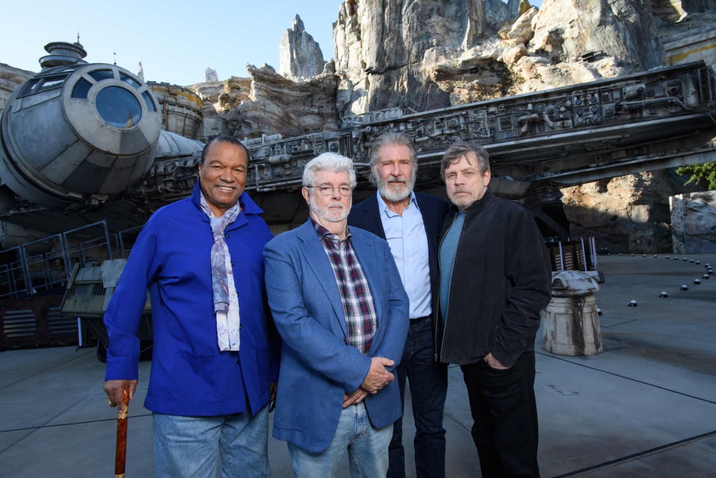 Billy Dee Williams, George Lucas, Harrison Ford, and Mark Hamill at the pre-opening launch of Star Wars: Galaxy's Edge at Disneyland.