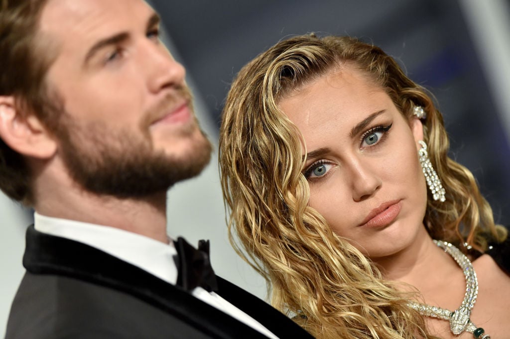 Miley Cyrus and Liam Hemsworth attend the 2019 Vanity Fair Oscar Party.