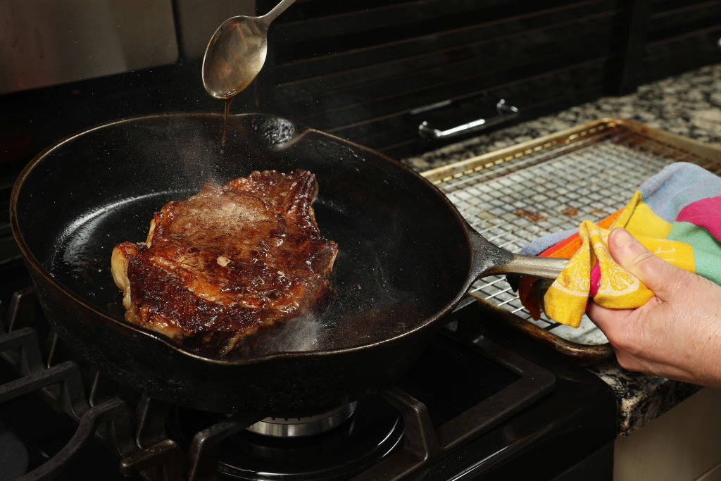 steak in a cast iron pan
