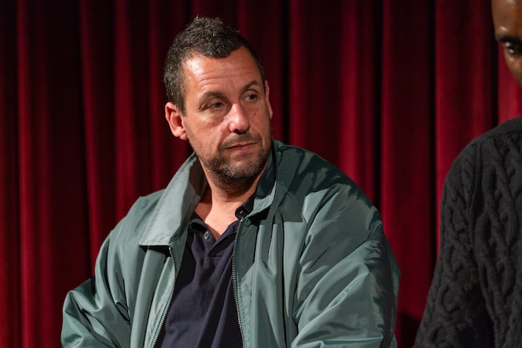 Adam Sandler speaks onstage