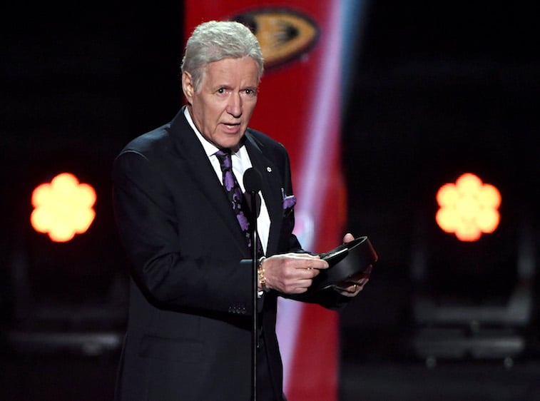 Alex Trebek speaks onstage