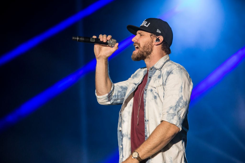 Chase Rice during a performance | Harmony Gerber/Getty Images