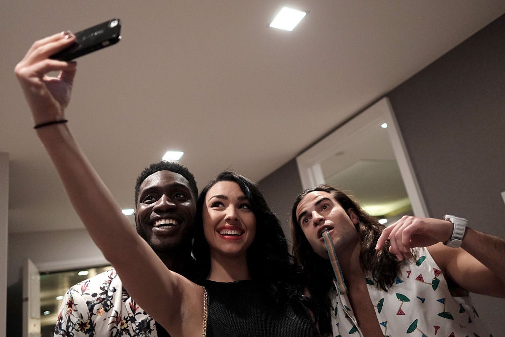 TV personalities Dean Bart-Plange, Kailah Casillas, and Dione Mariani take a selfie during the MTV Press Junket & Cocktail Party