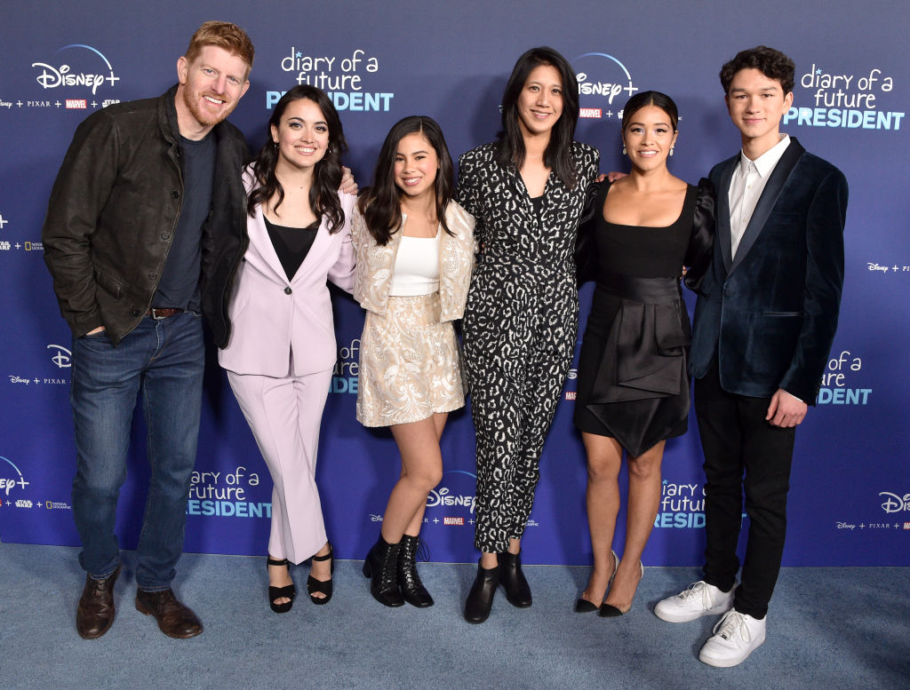 Michael Weaver, Ilana Pena, Tess Romero, Agnes Chu, Gina Rodriguez, and Charlie Bushnell attend the Premiere Of Disney +'s "Diary Of A Future President"