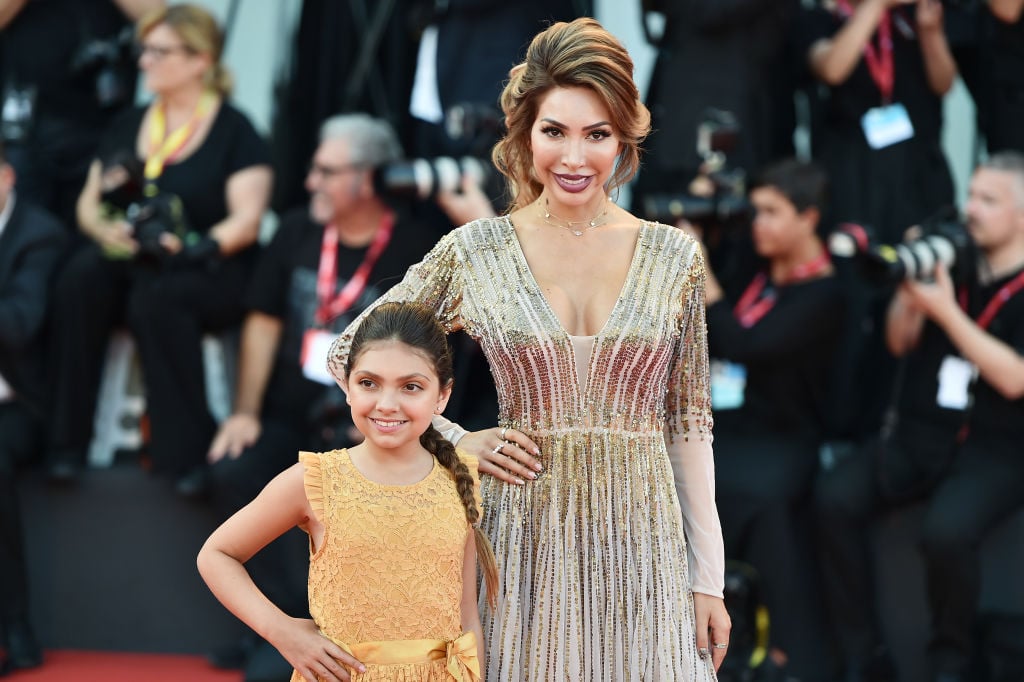 Farrah Abraham and Sophia Laurent Abraham walk the red carpet