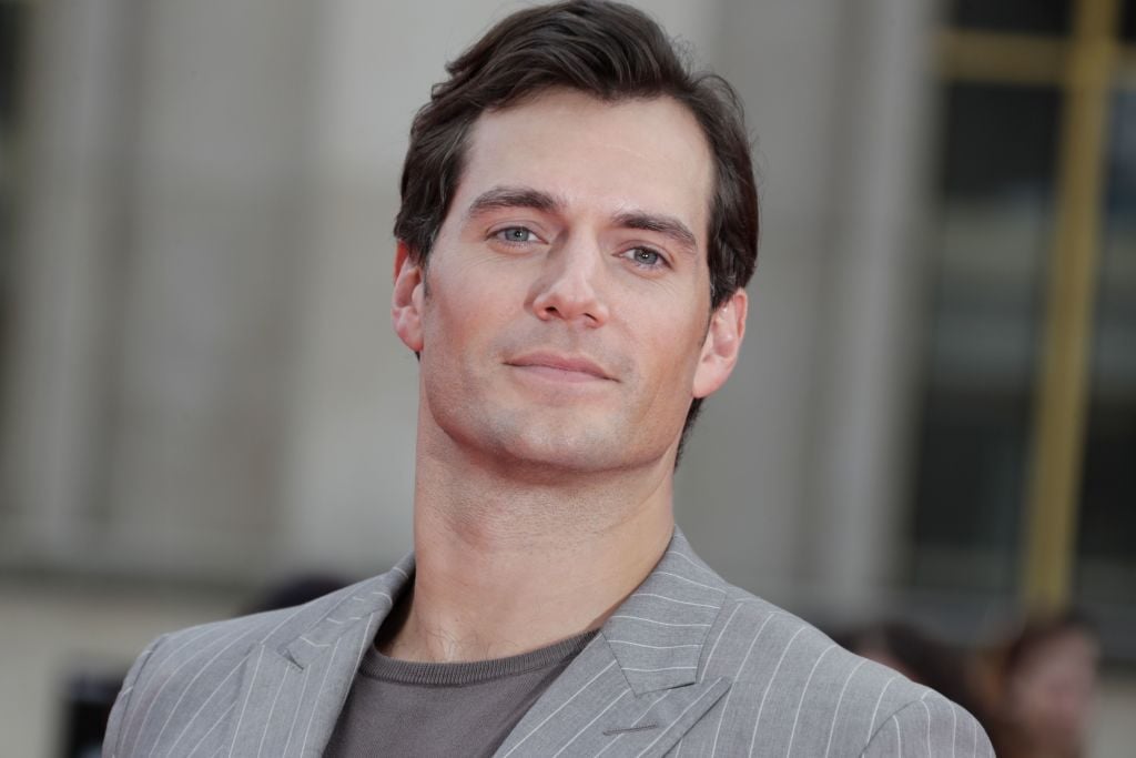 Henry Cavill poses on the red carpet.