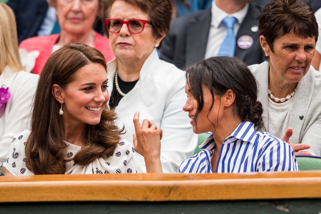 The Duchess of Cambridge and the Duchess of Sussex attend day twelve match of the 2018 Wimbledon