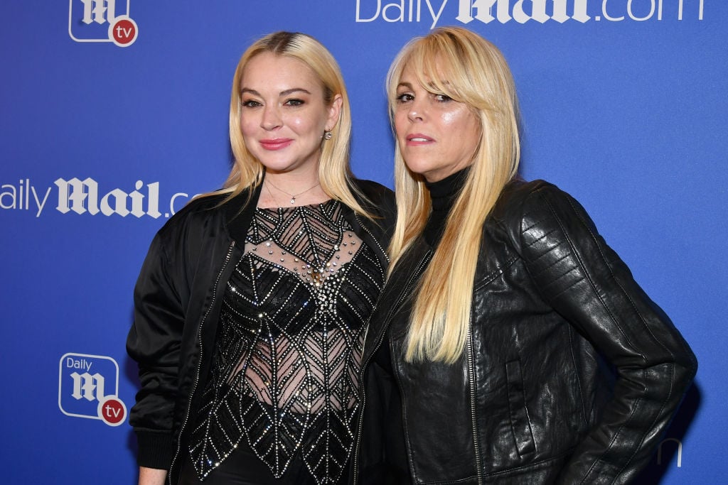 Lindsay Lohan (L) and Dina Lohan attend DailyMail.com & DailyMailTV Holiday Party
