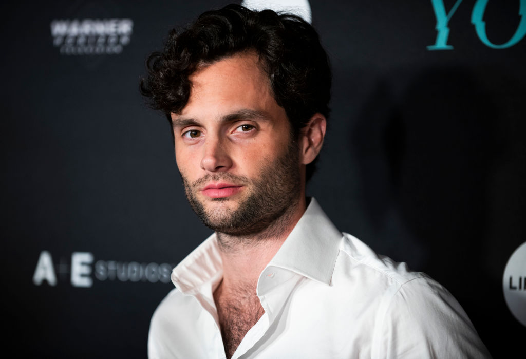 Penn Badgley in front of repeating background for Netflix's "You"