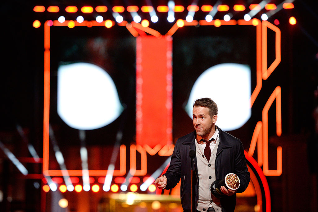 Ryan Reynolds accepts an award at the MTV Movie Awards