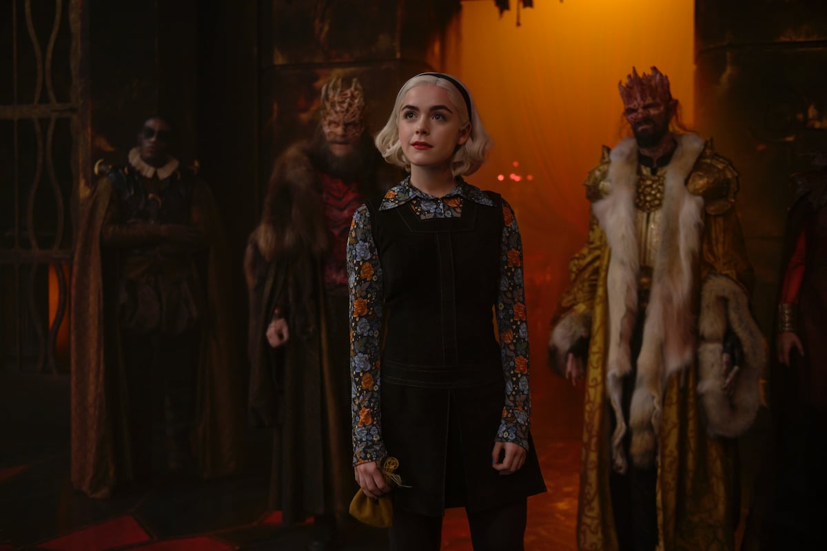 Sabrina Spellman in front of the kings of Hell, 'CHILLING ADVENTURES OF SABRINA.'