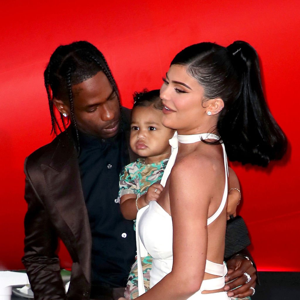 Travis Scott, Stormi Webster, and Kylie Jenner attend the premiere Look Mom I Can Fly