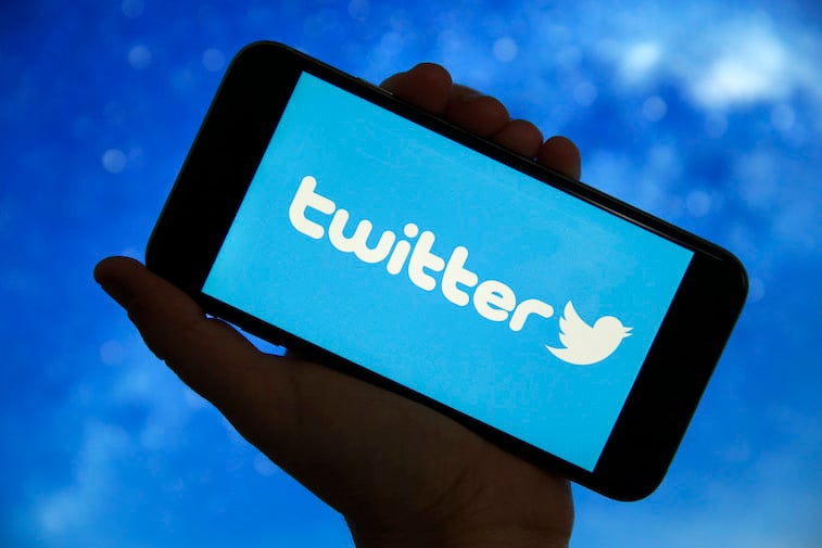 Twitter logo shown on a phone screen