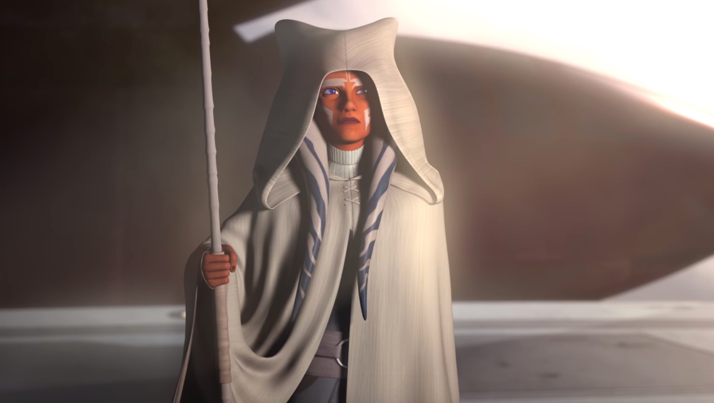 Ahsoka Tano stands with her white robe and staff in the Epilogue of 'Star Wars Rebels.'