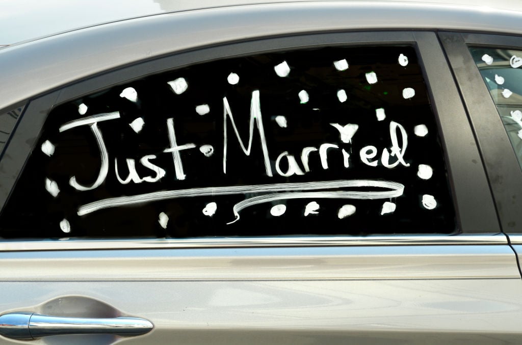 Just Married written on car window