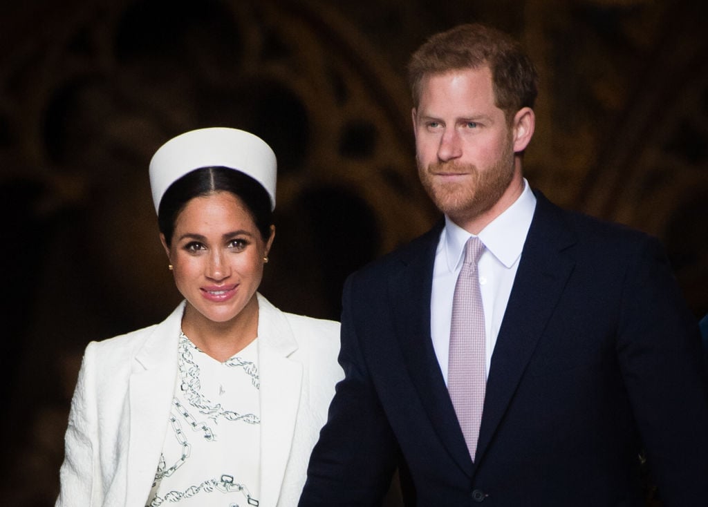 Prince Harry and Meghan Markle attend a service.