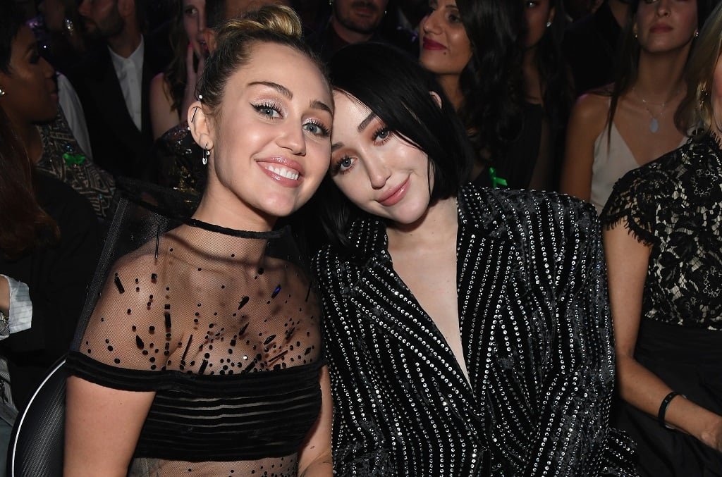 Miley Cyrus (L) and Noah Cyrus pose during the 61st Annual GRAMMY Awards on February 10, 2019 