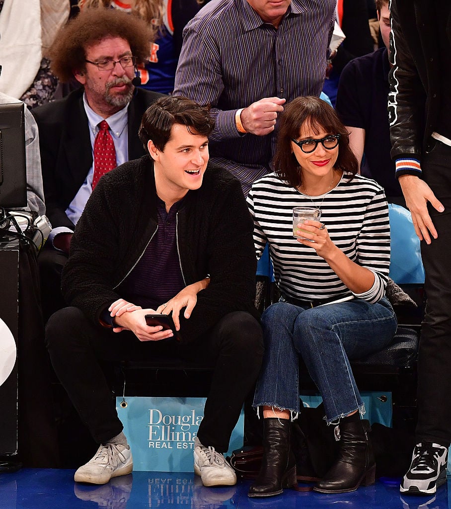 Rashida Jones and Ezra Koenig at a basketball game