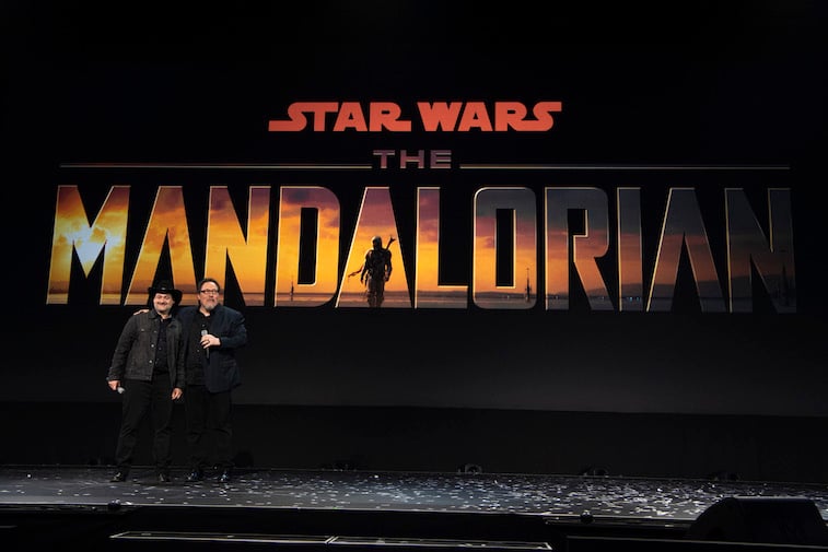 Dave Filoni and Jon Favreau speak onstage