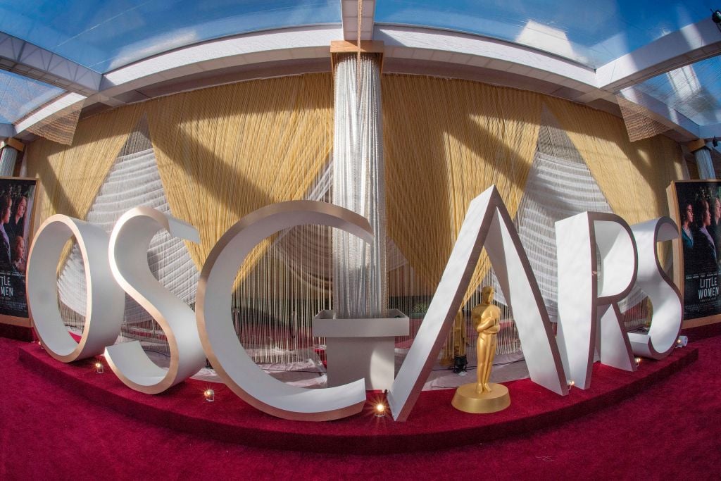 An Oscars sign and statue on display