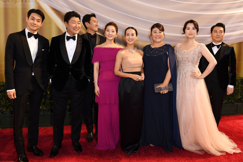 The cast of "Parasite" on the red carpet at the Oscars in February 2020