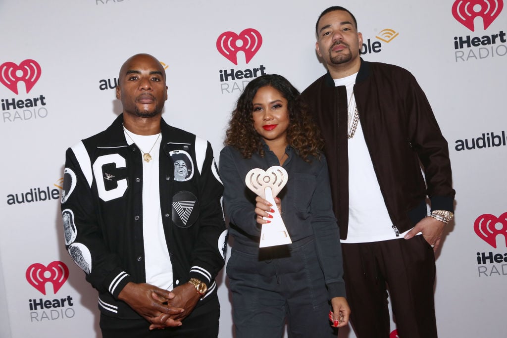 Charlamagne Tha God, Angela Yee, and DJ Envy on the red carpet in January 2020