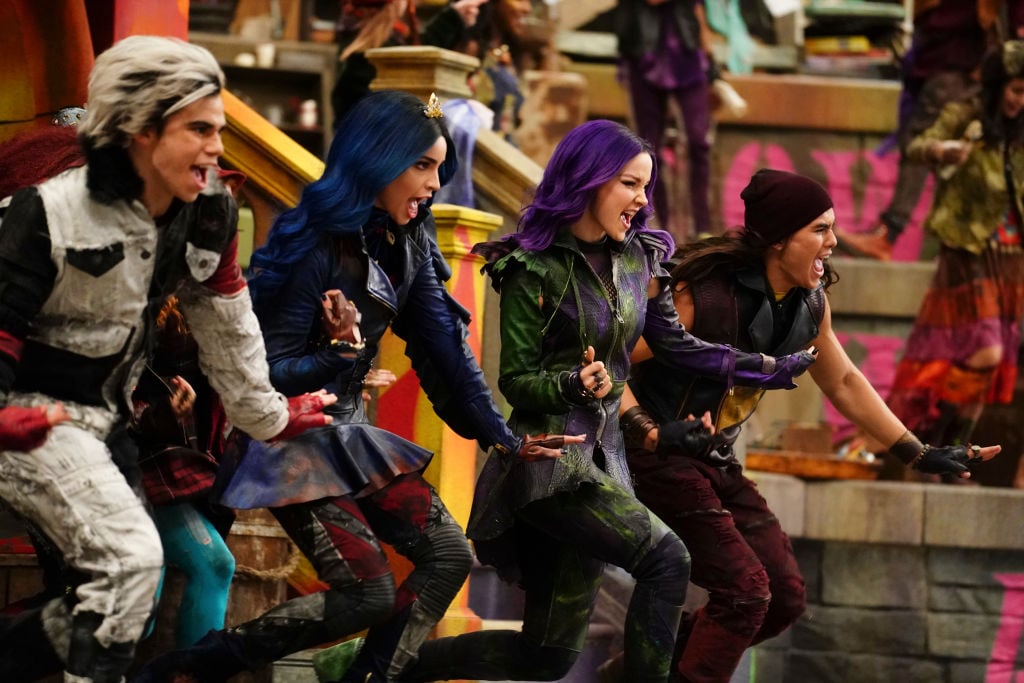 Characters Carlos, Evie, Mal, and Jay of Disney Channel's 'Descendants 3'