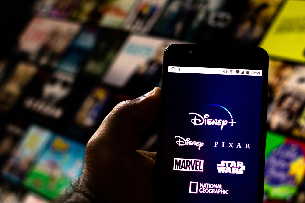 Disney+ (Plus) logo is seen displayed on a smartphone   