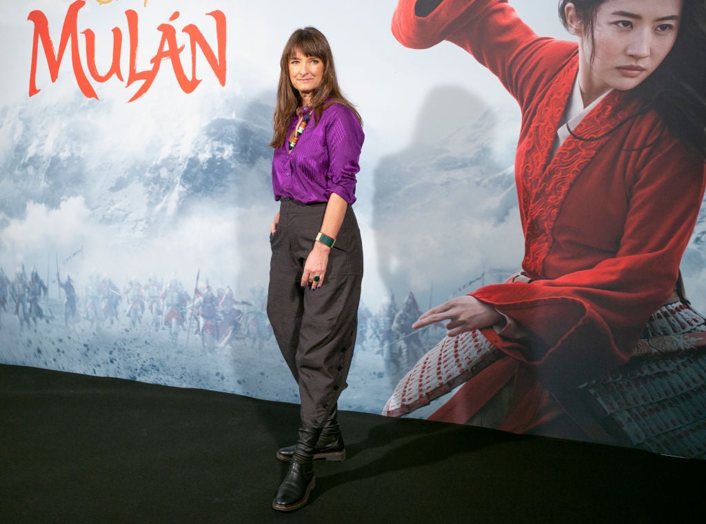 The costume designer of the film, Bina Dailinger, pose for the photocall of the Disney film, 'Mulan'