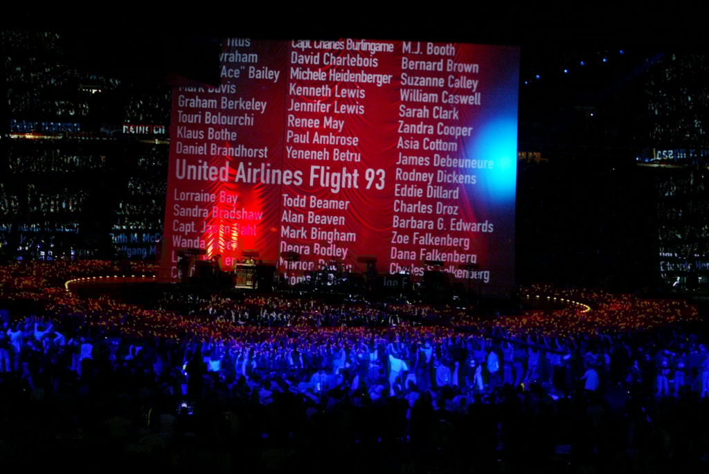 U2 at 2002 Super Bowl XXXVI displaying names of Sept. 11 attack victims just months after 9/11/01