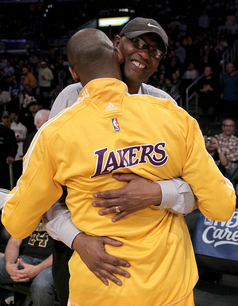 Kobe Bryant hugs his father, Joe 'Jellybean' Bryant in 2010