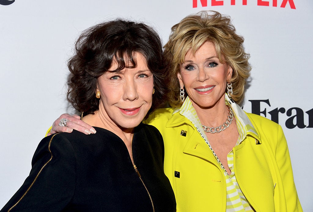 Lily Tomlin (L) and Jane Fonda arrive at the premiere of Netflix's "Grace and Frankie" at the Regal Cinemas L.A. Live.