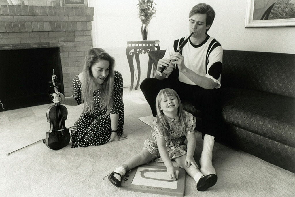 Jim Carrey with Melissa Womer and their daughter 