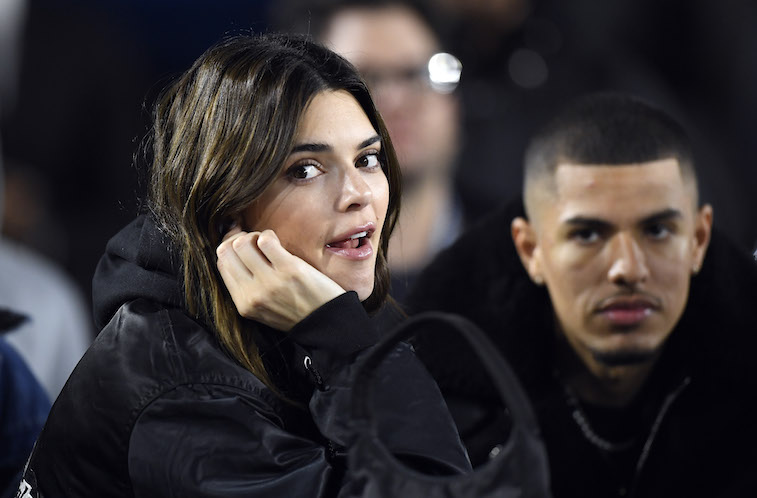 Kendall Jenner attends a football game