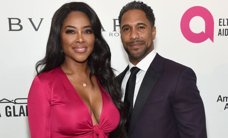 Kenya Moore and Marc Daly at an event