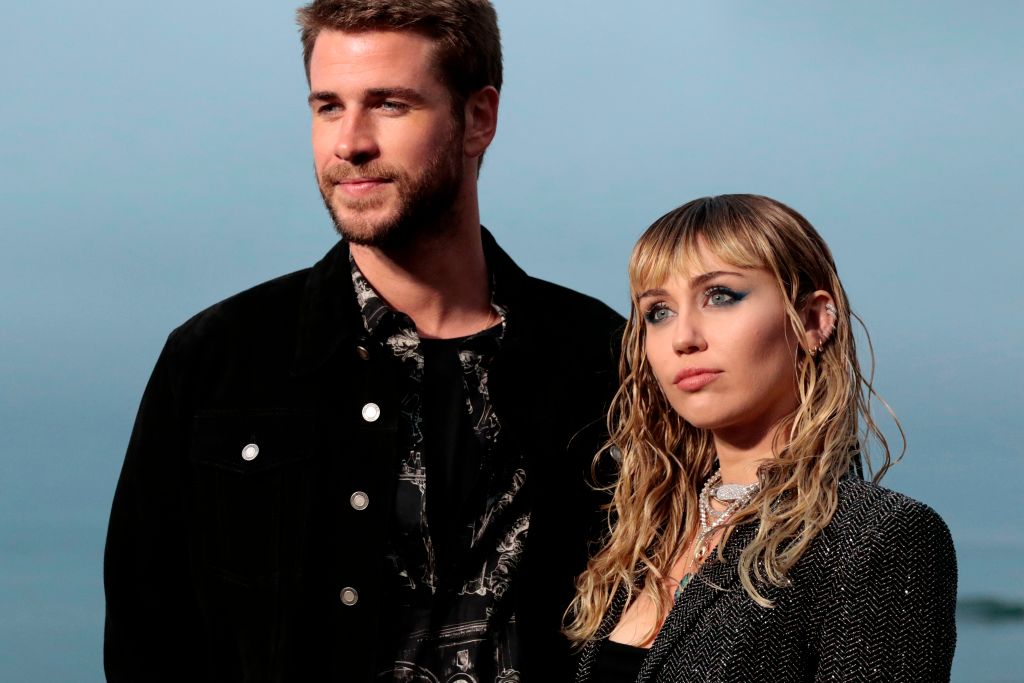 Miley Cyrus and Liam Hemsworth arrive for the Saint Laurent Men's Spring-Summer 2020 runway show in Malibu 