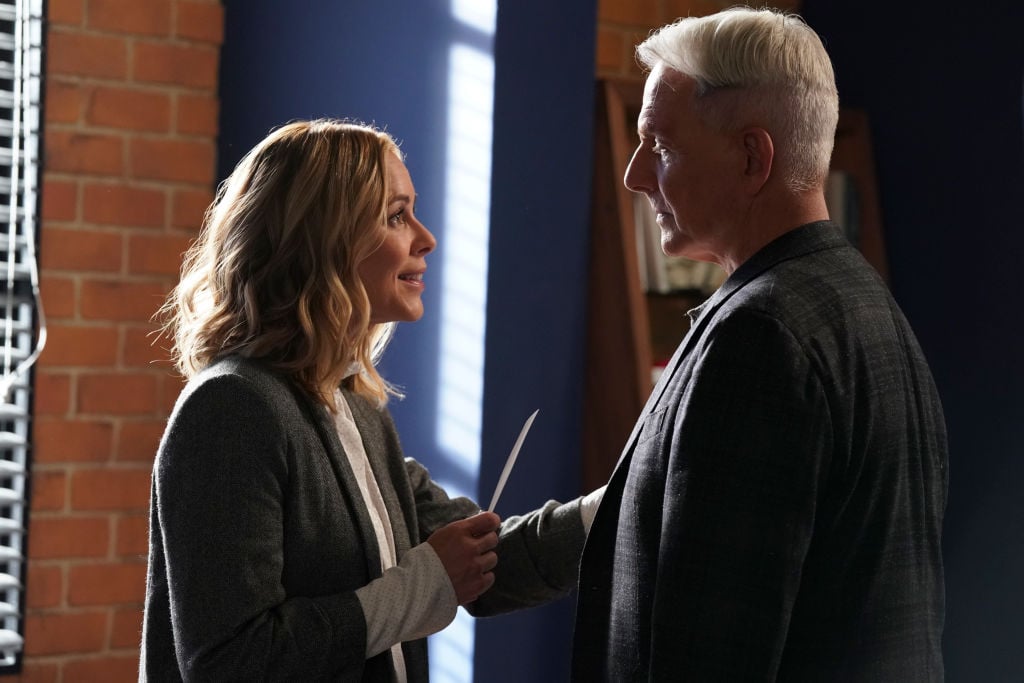 Maria Bello and Mark Harmon on the set of NCIS |  by Patrick McElhenney/CBS via Getty Images