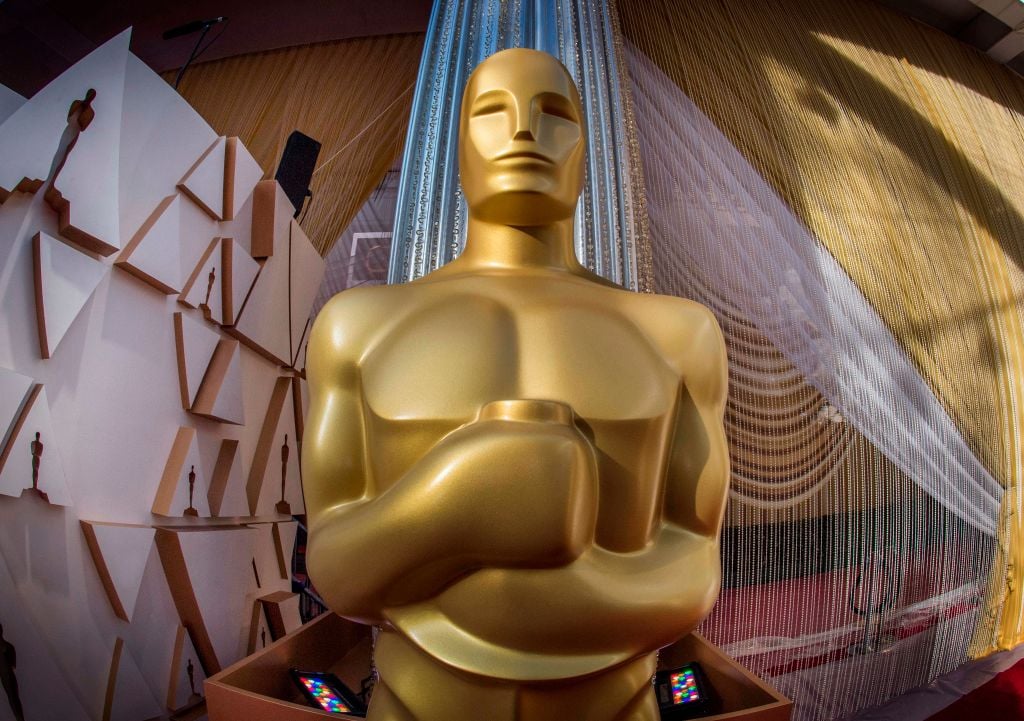 An Oscars statue on the red carpet