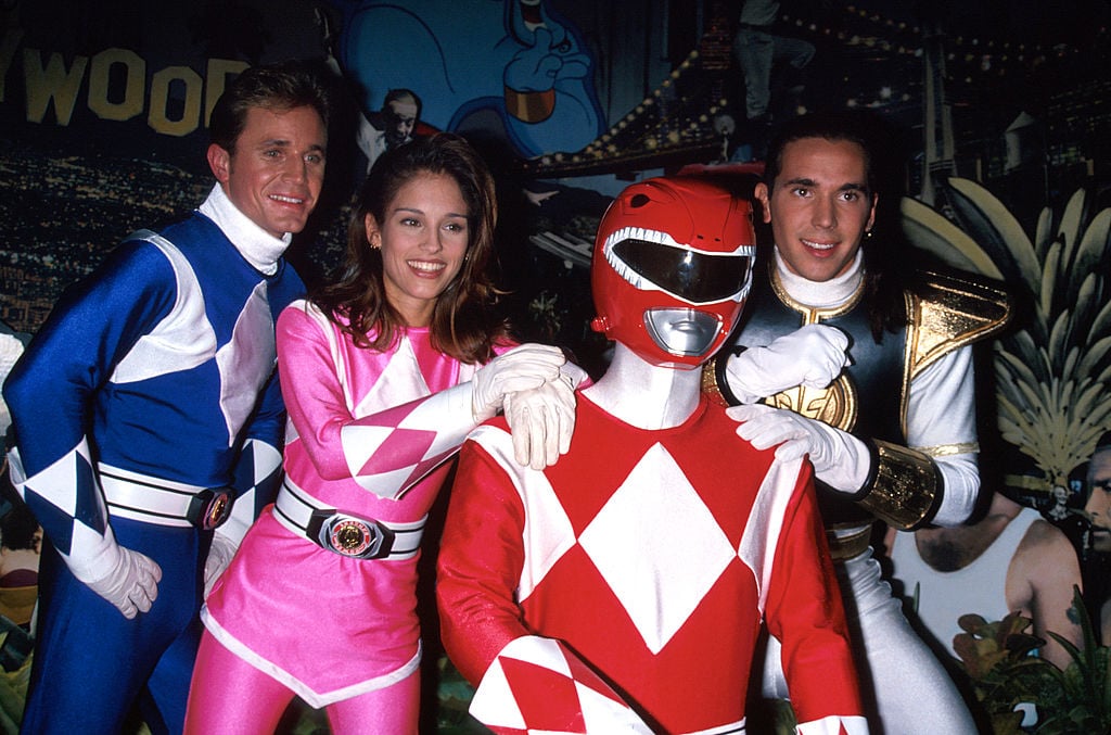 (L-R) Actors David Yost, Amy Jo Johnson and Jason David Frank costumed as 'Power Rangers' circa 1995