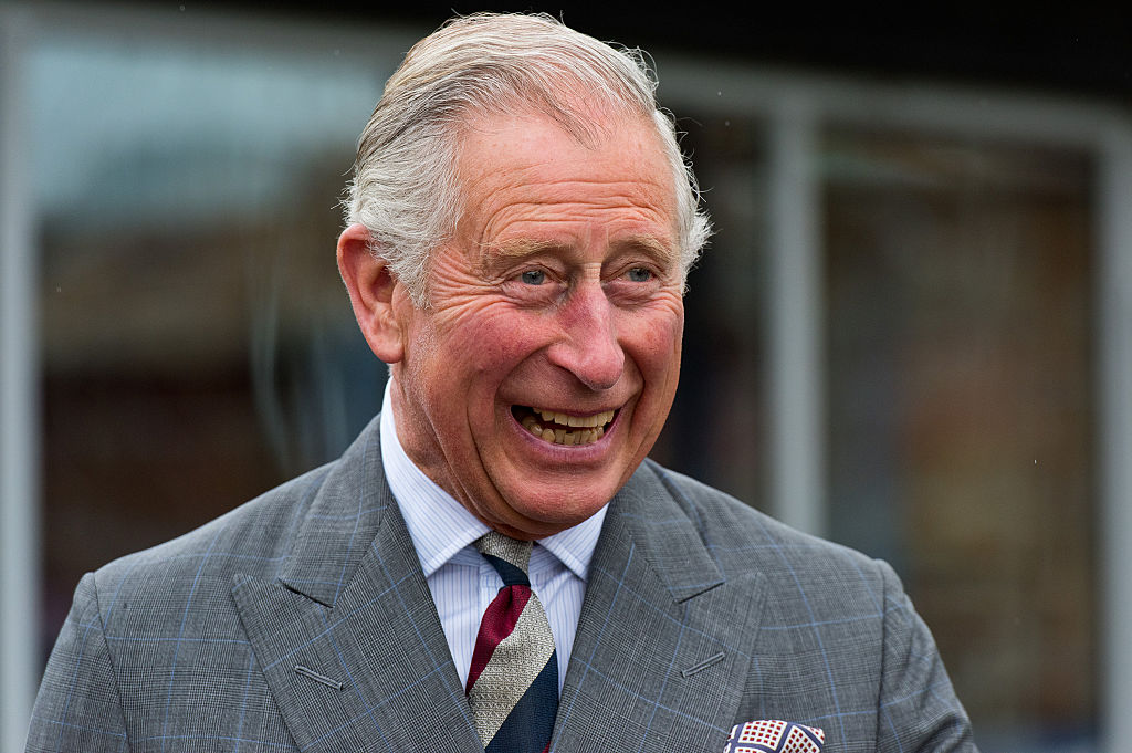 Prince Charles, Prince of Wales meets residents of The Guinness Partnership's 250th affordable home in Poundbury.