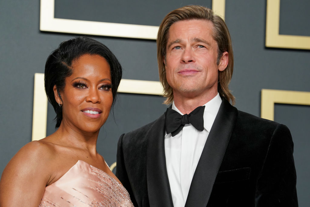 Regina King and Brad Pitt