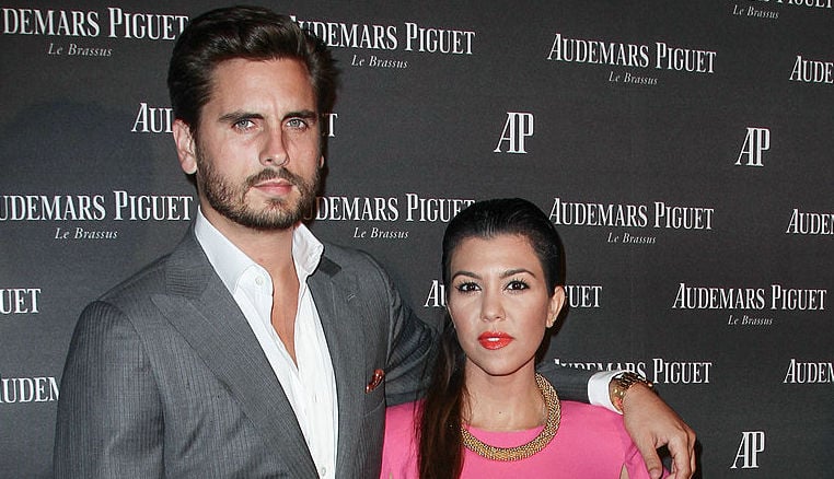 Scott Disick and Kourtney Kardashian at a party in September 2013