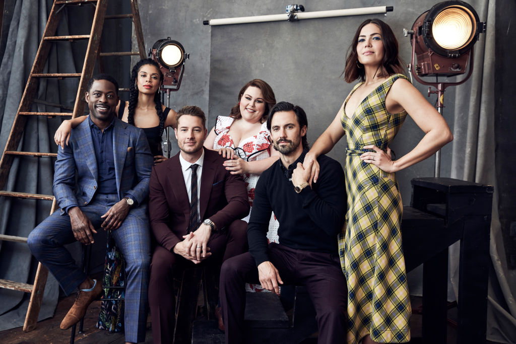 This Is Us cast in front of a textured background